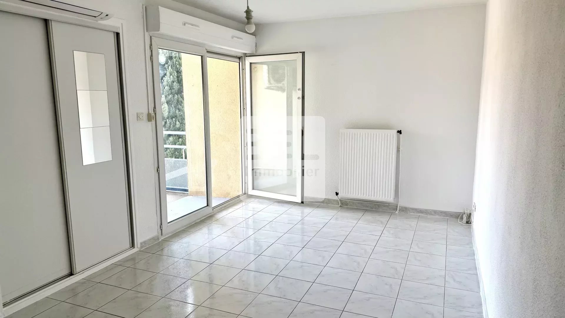 Appartement T3 avec terrasse, parking et cave