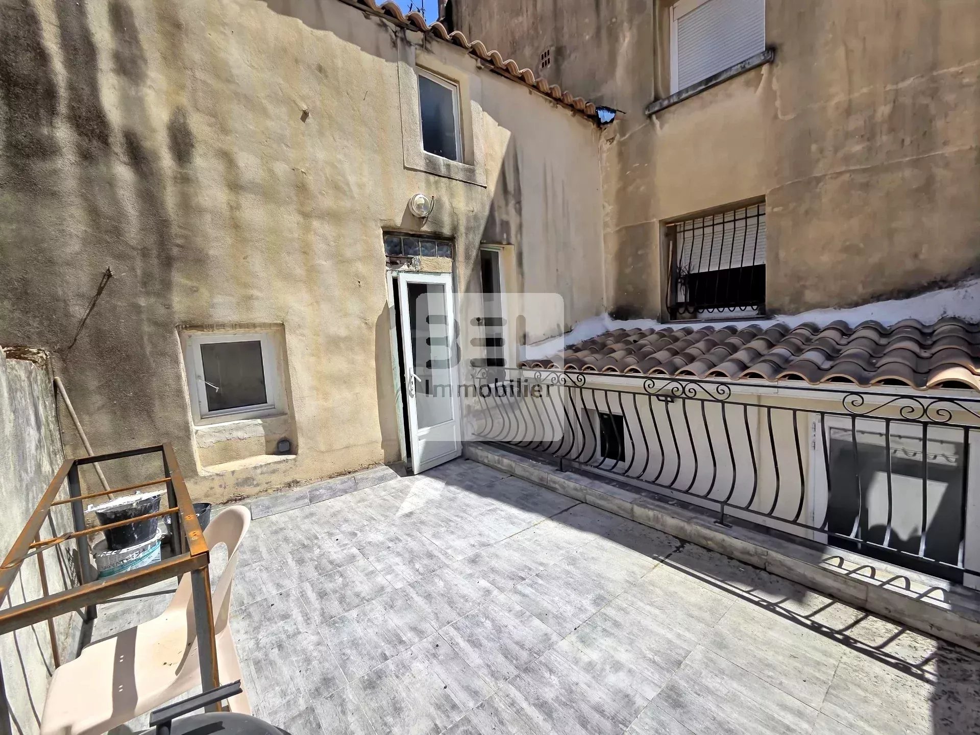 Maison de ville avec terrasse ensoleillée
